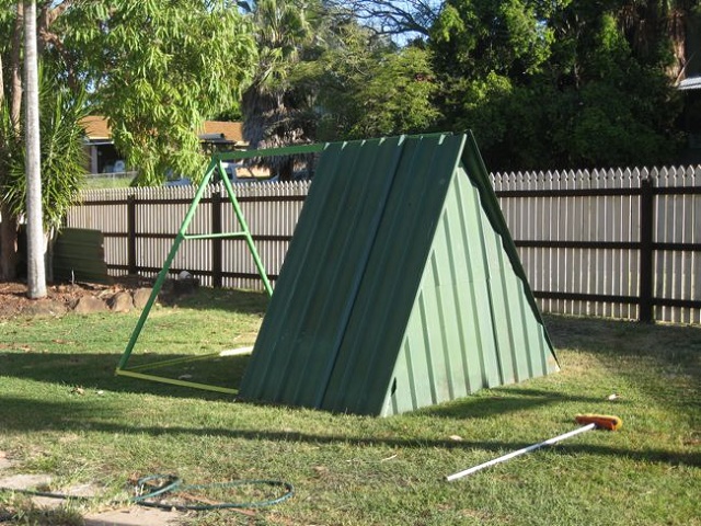 An Old Swing Set Frame Turned Into A DIY Chicken Coop...