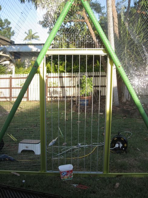 An Old Swing Set Frame Turned Into A DIY Chicken Coop...