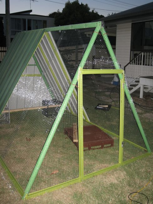 An Old Swing Set Frame Turned Into A DIY Chicken Coop...