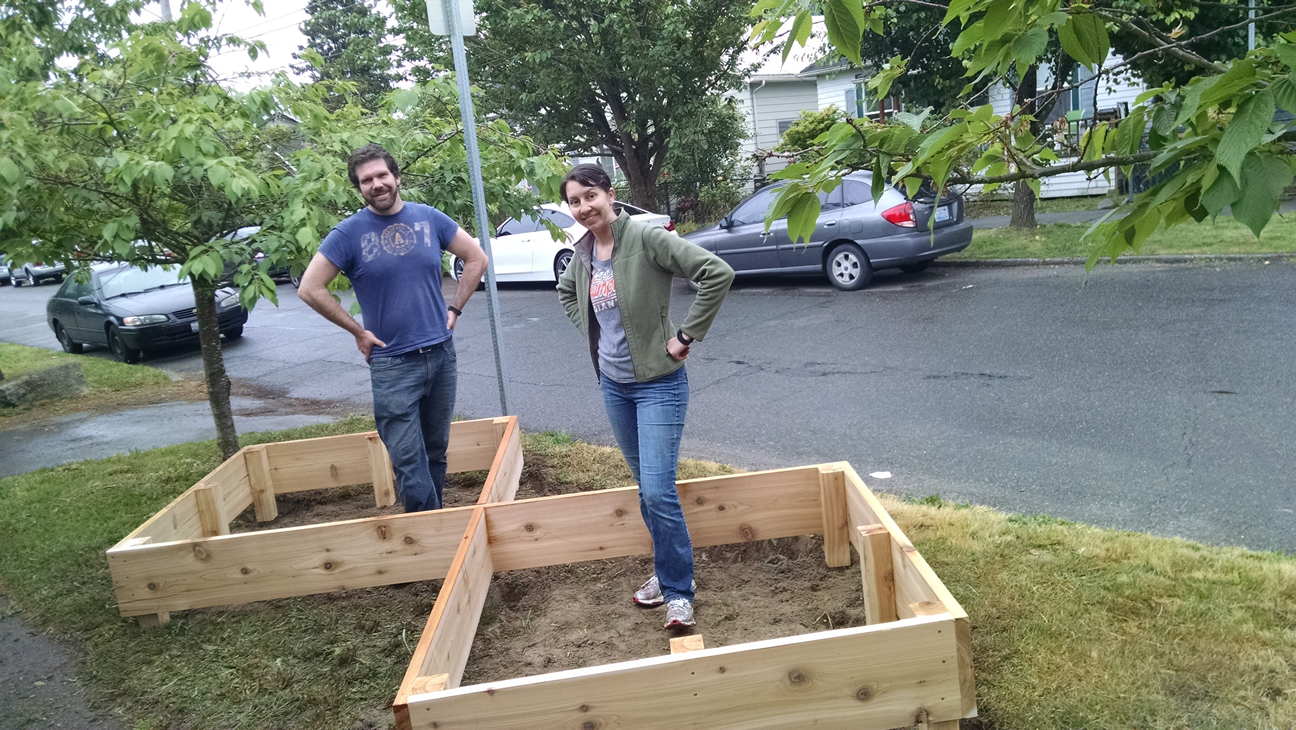Couple Build A Raised Garden On Their Front Lawn To Grow Food For Themselves & Their Neighbors...