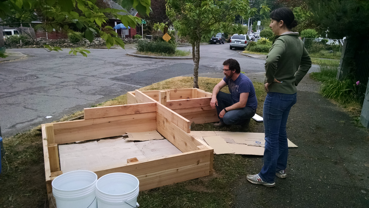 Couple Build A Raised Garden On Their Front Lawn To Grow Food For Themselves & Their Neighbors...